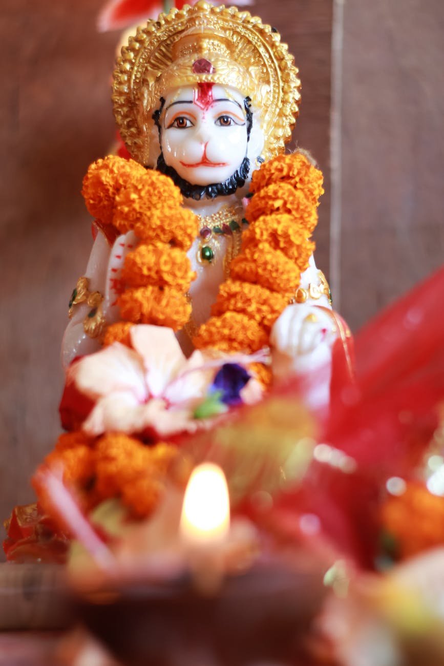 orange garland on a hindu god statue